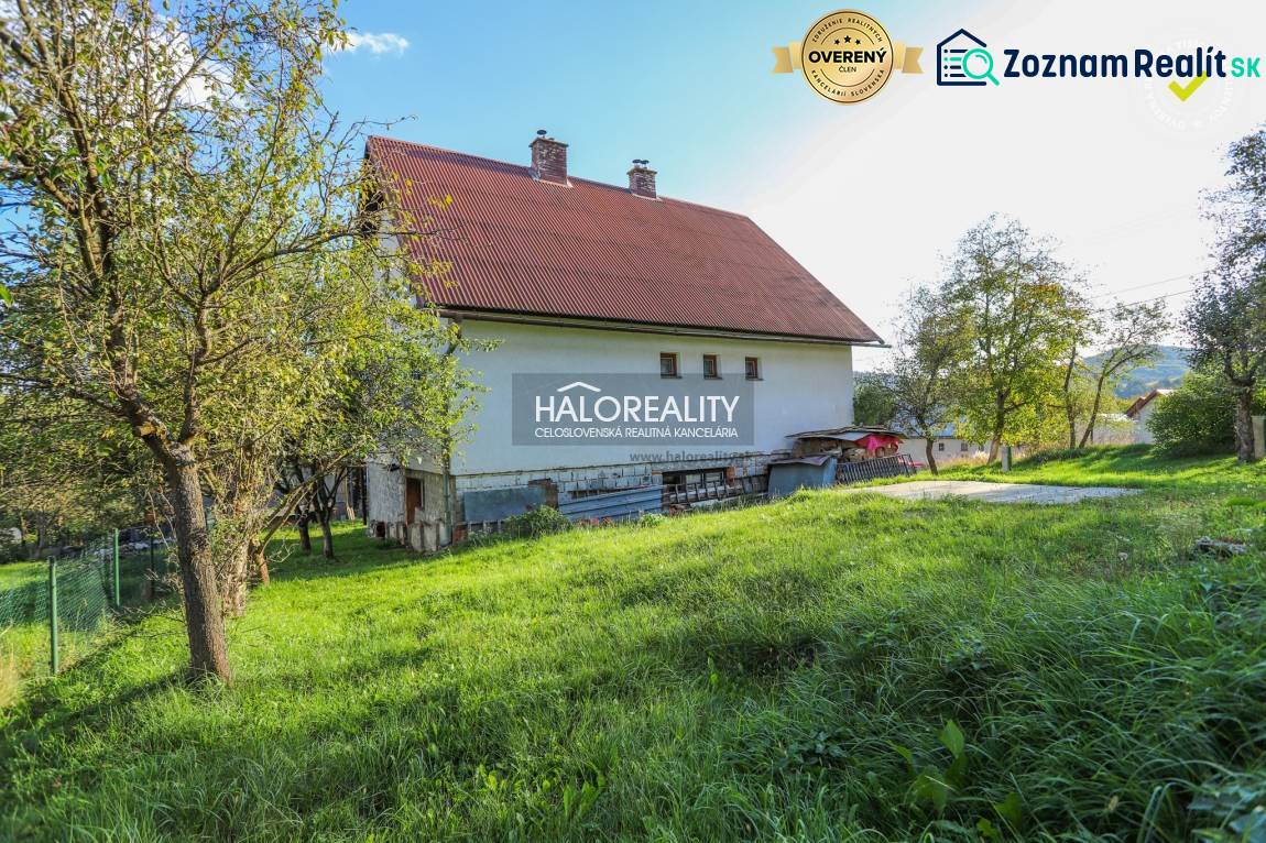 A family house in Papradno with a spacious garden and surrounding greenery.