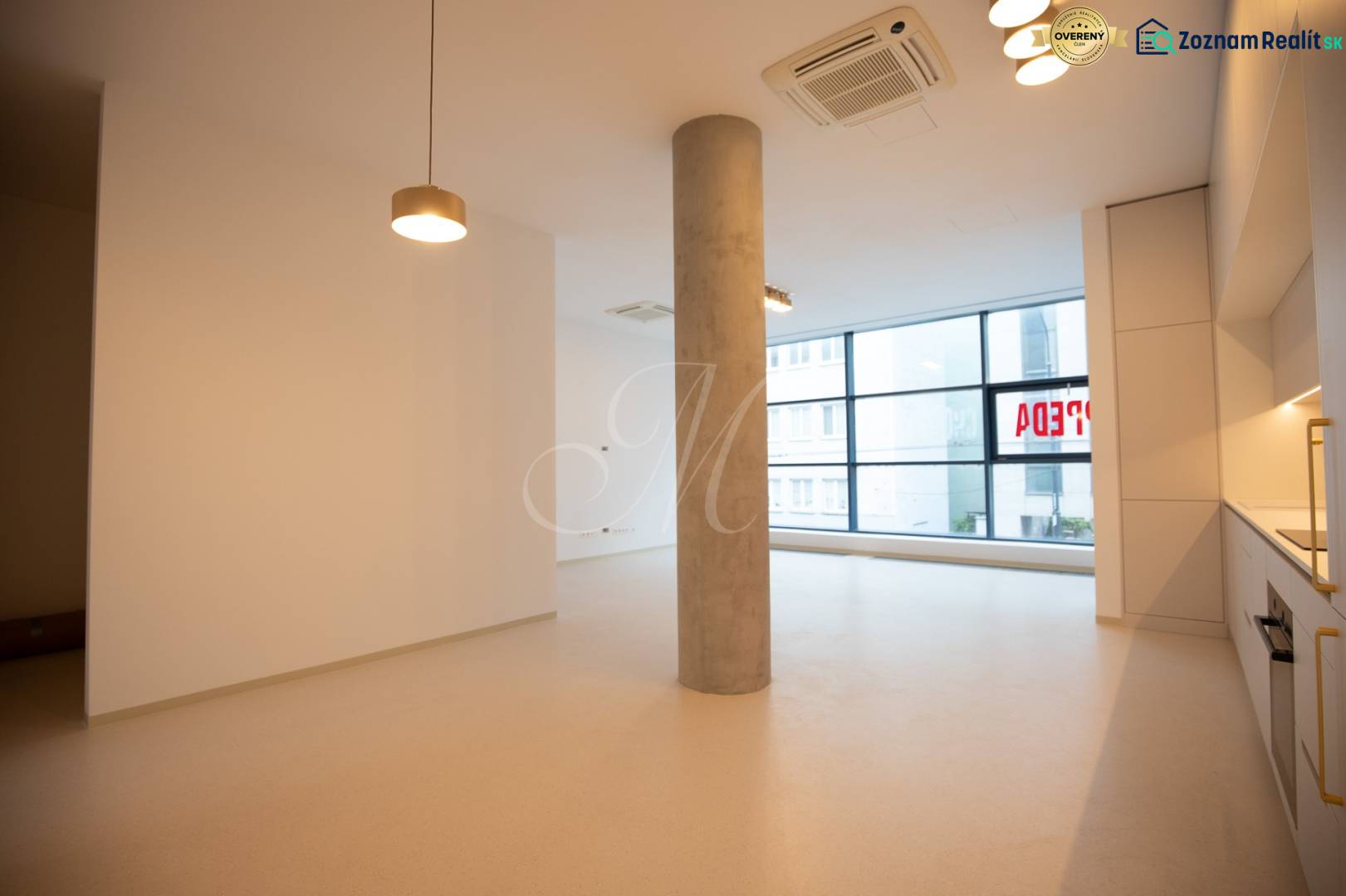 A bright room in a 4-room apartment with built-in wardrobes and large windows.