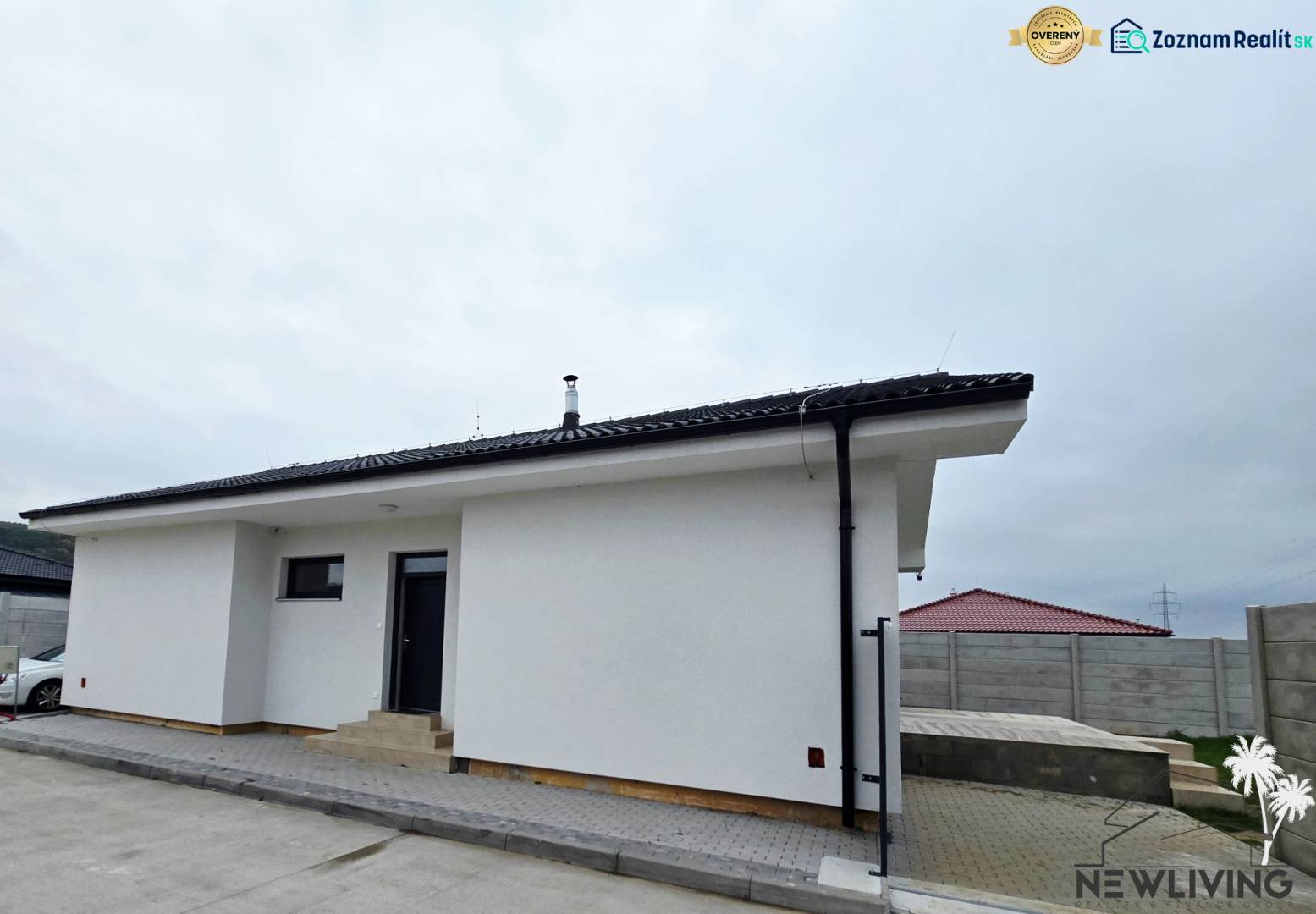 A family house on Veterná Street in Sokolovce with a white facade and a sloped roof.