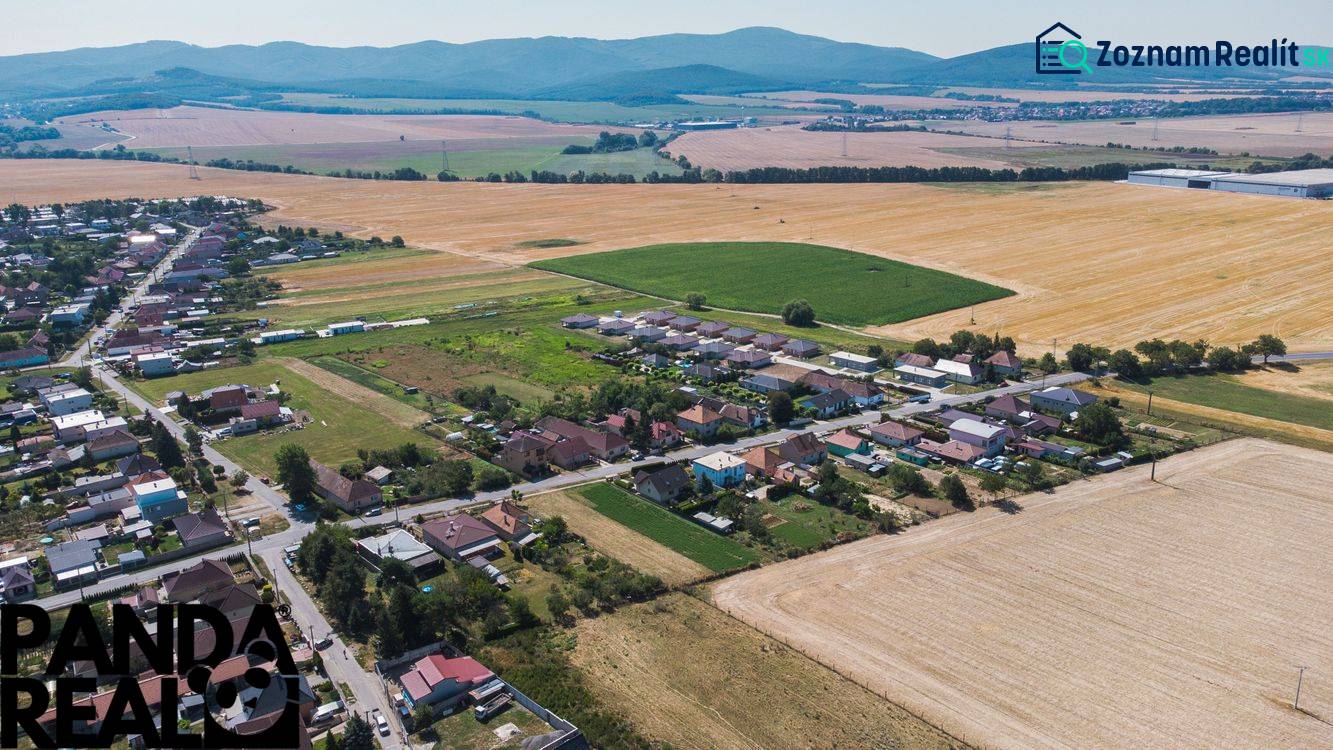 Aerial view of extensive residential plots in Práznovce with surrounding fields.