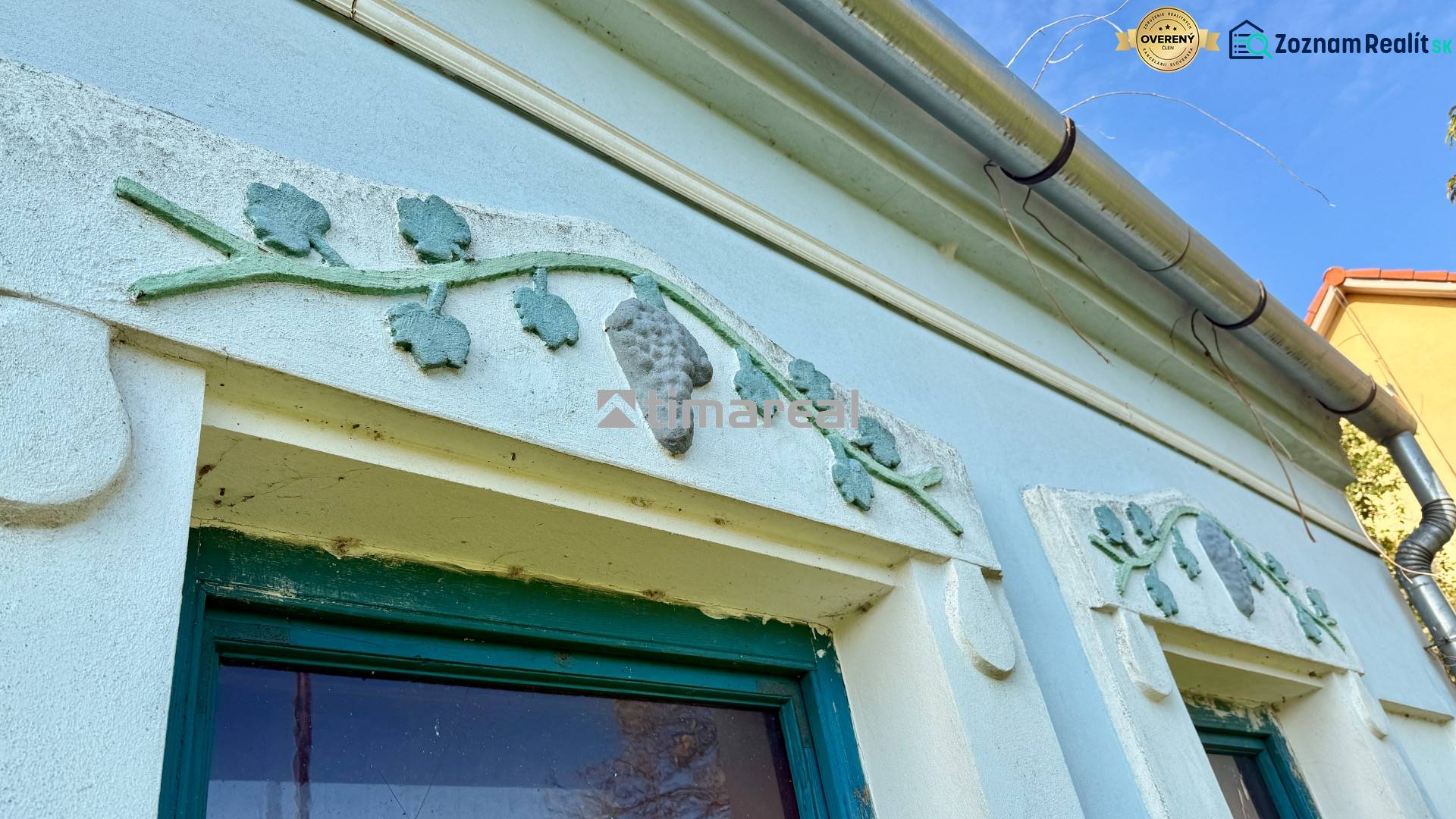 A family house in Štefanová, decoration above the window depicting a vine.