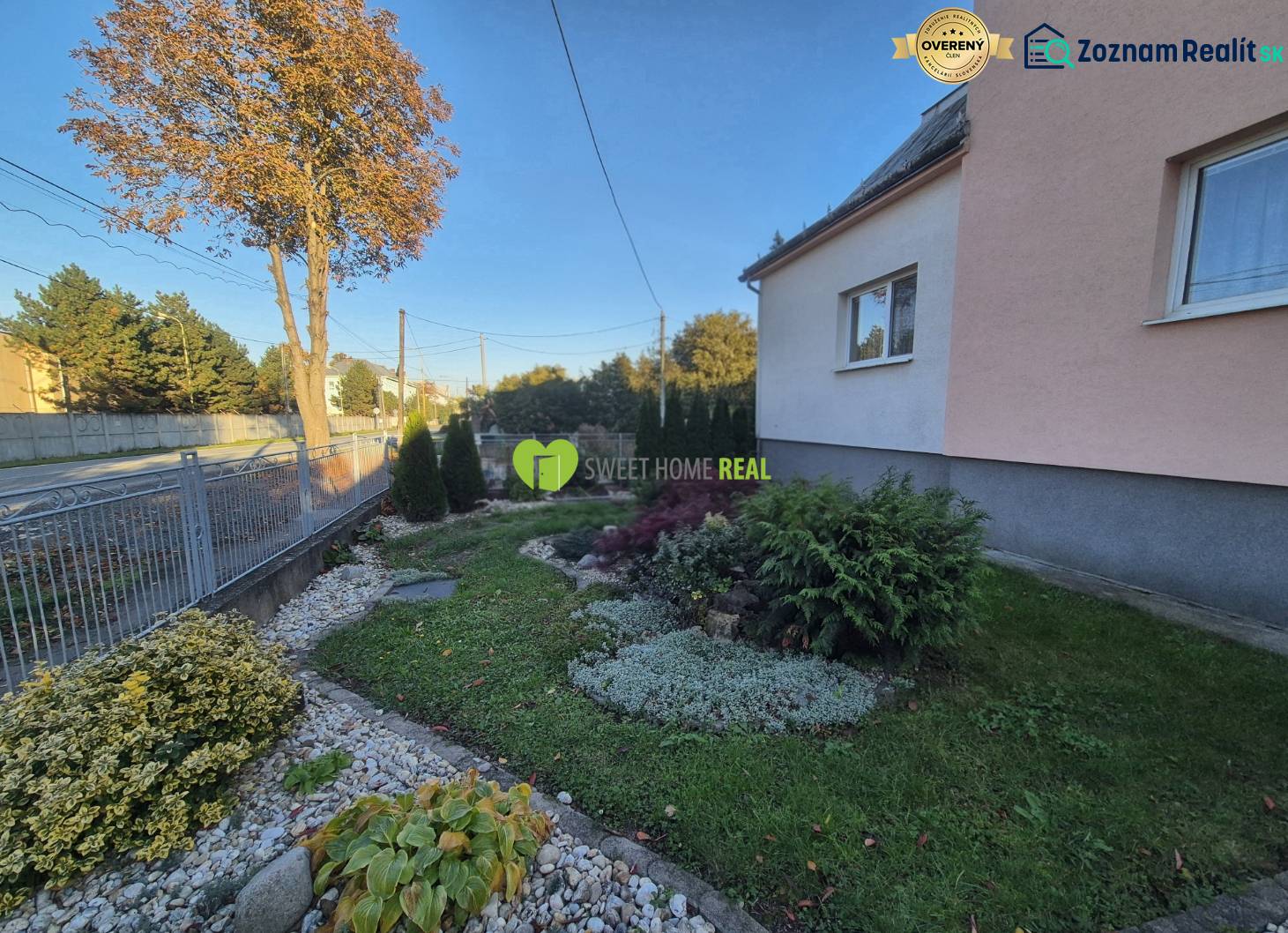 The garden at the family house on Kpt. Nálepku Street in Trebišov with well-maintained greenery and trees.