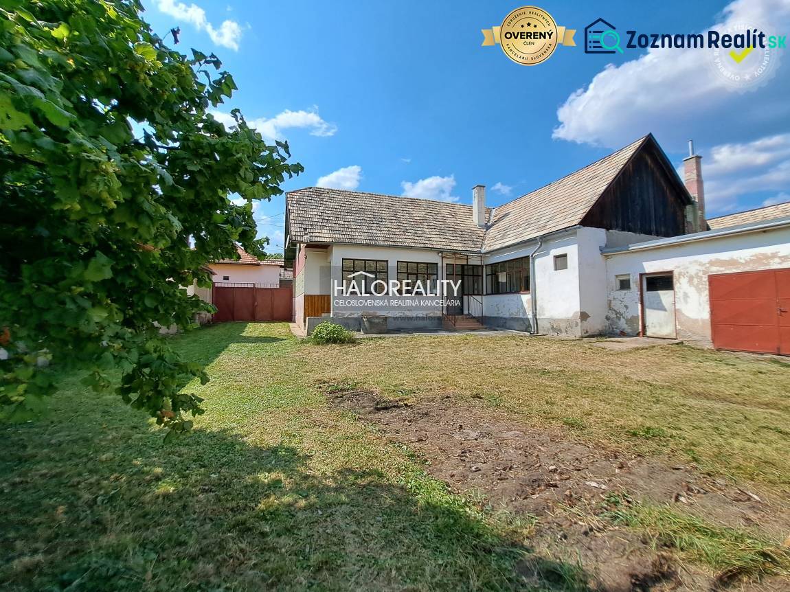A family house in Zvolen with a lawn and an annex in the countryside.