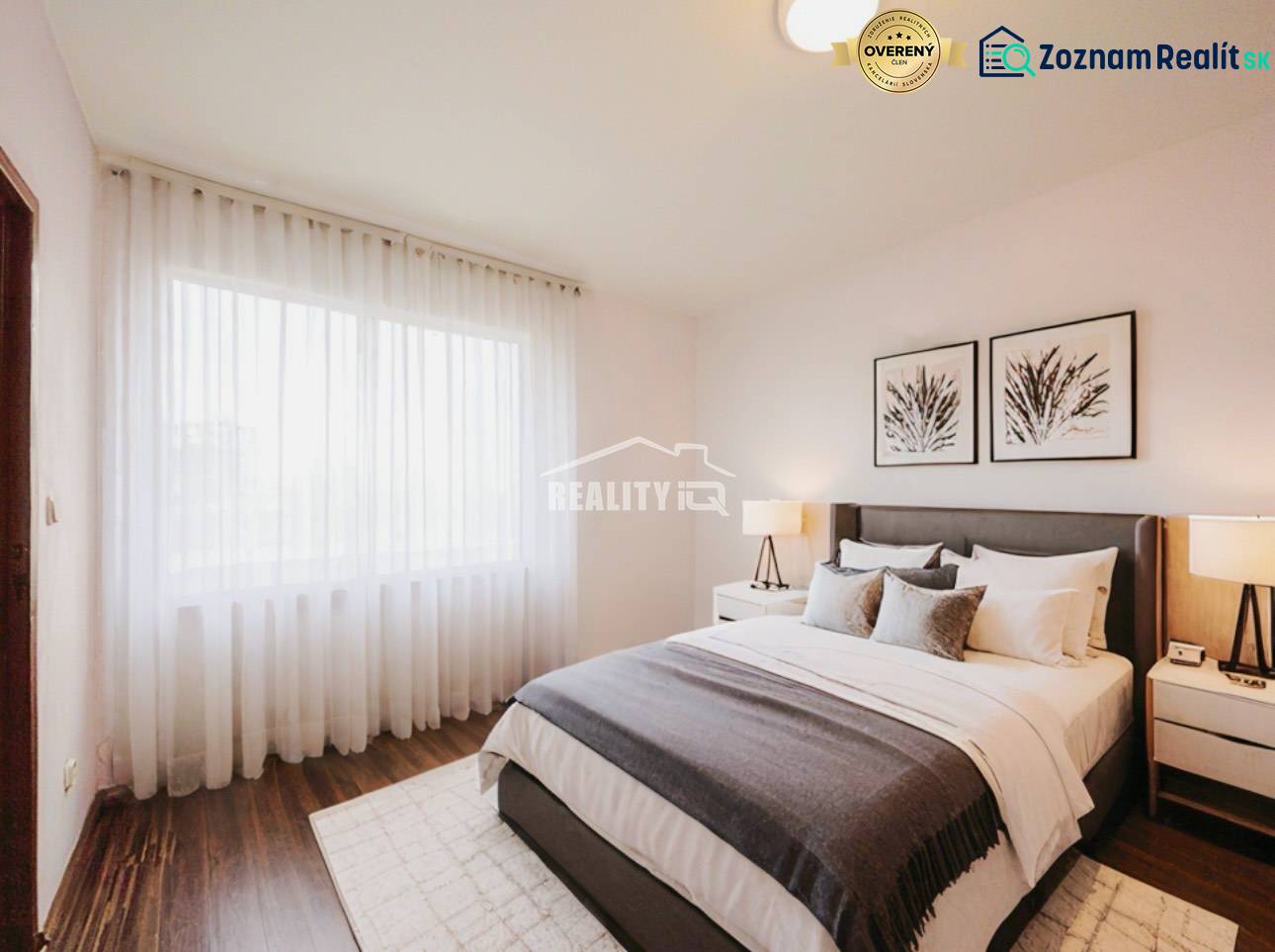 Bedroom in a 3-room apartment with a bed, nightstands, and a floor with a wooden decor.