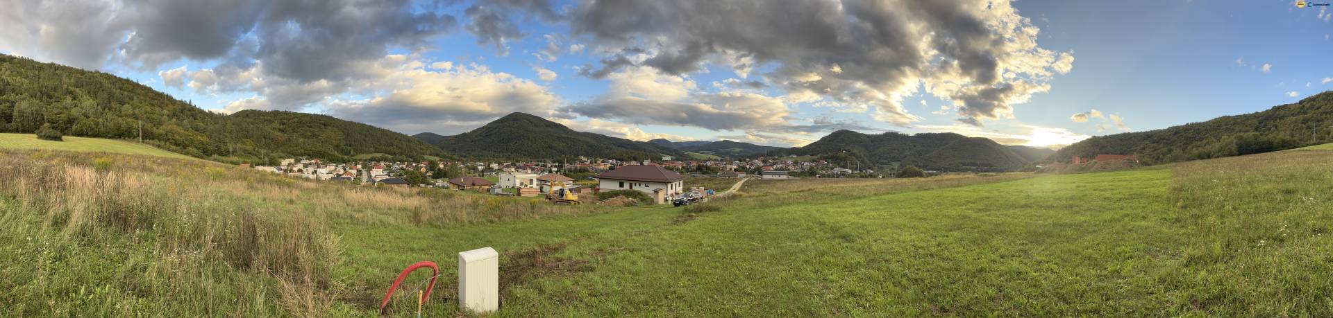 Panoramic view of the land - living in Margecany surrounded by hills and clouds.