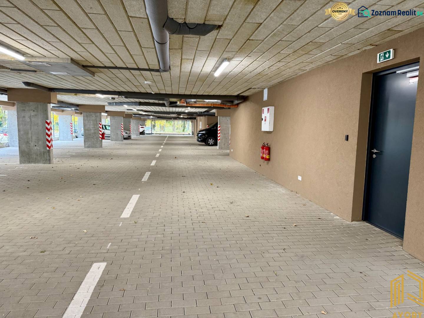 Parking lot with parking spaces and markings, tiled floor, in garages.