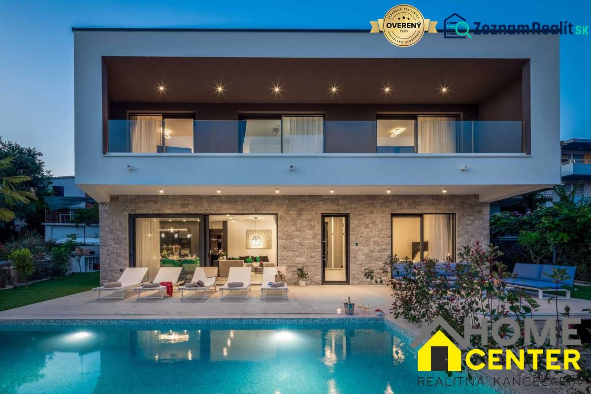 A villa in Bale with a pool and terrace, surrounded by greenery and relaxation areas.