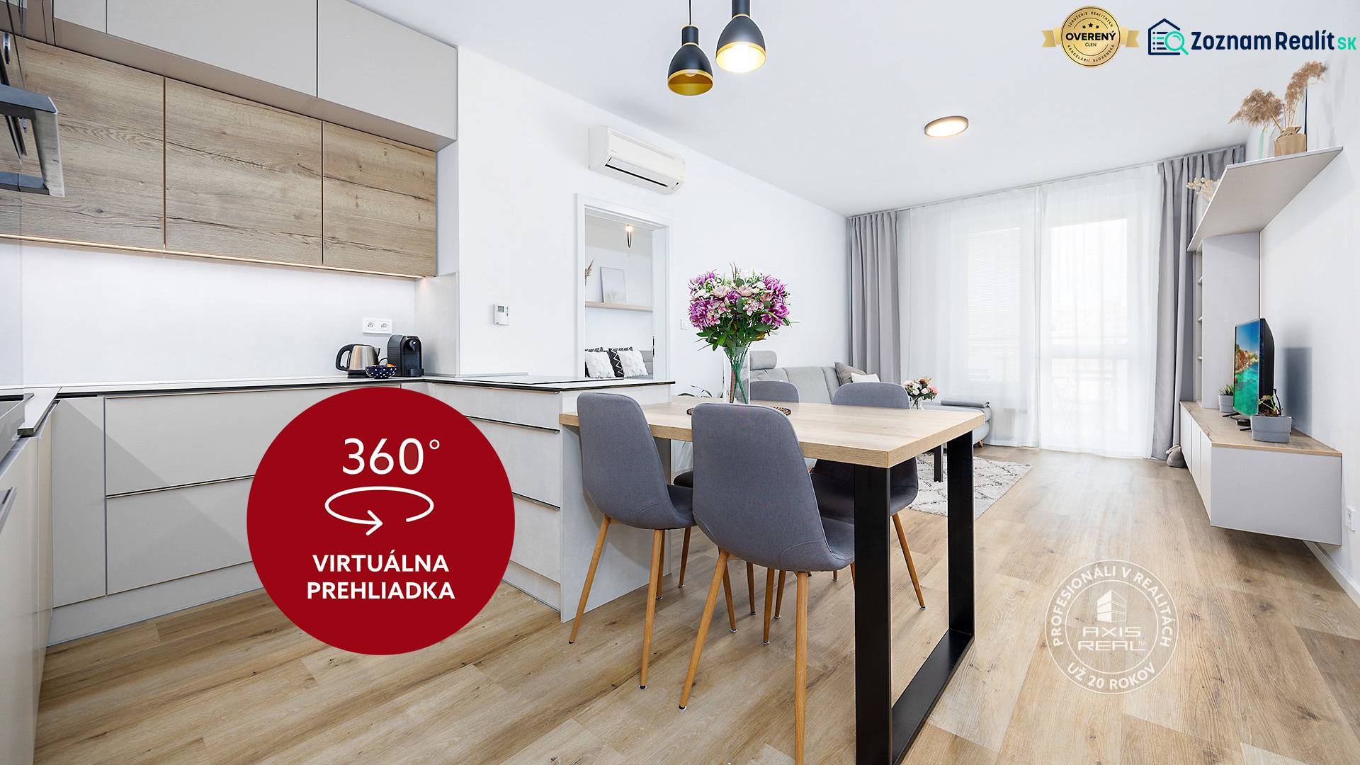 Interior of a 2-room apartment with a kitchen unit, dining table, and floor with wooden decor.