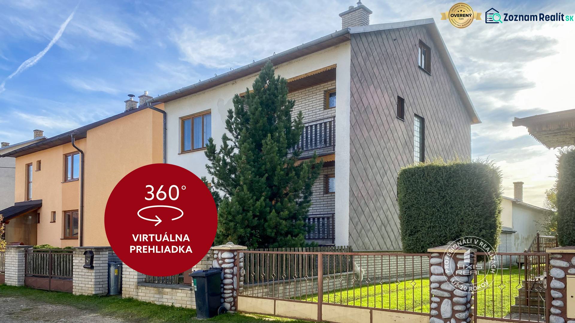 A family house on Kamienka Street in Kamienka with wooden cladding and well-maintained greenery.
