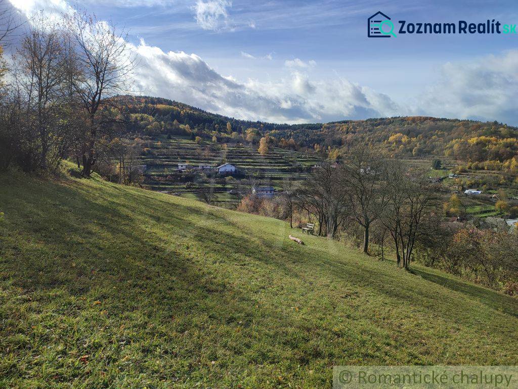 Autumn nature in the gardens in Hlboké nad Váhom with hills and trees.