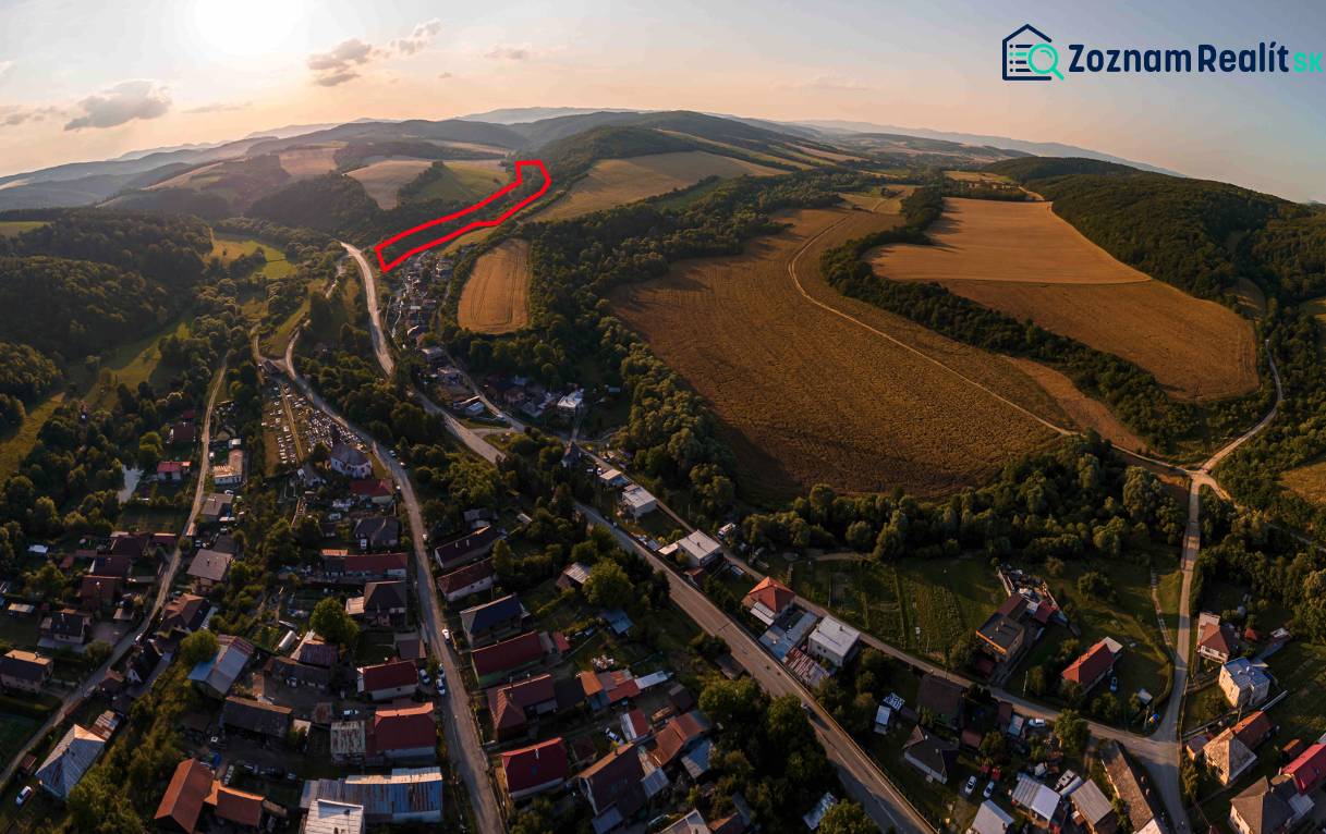 Aerial view of agricultural and forest lands around Rokycany at sunset.