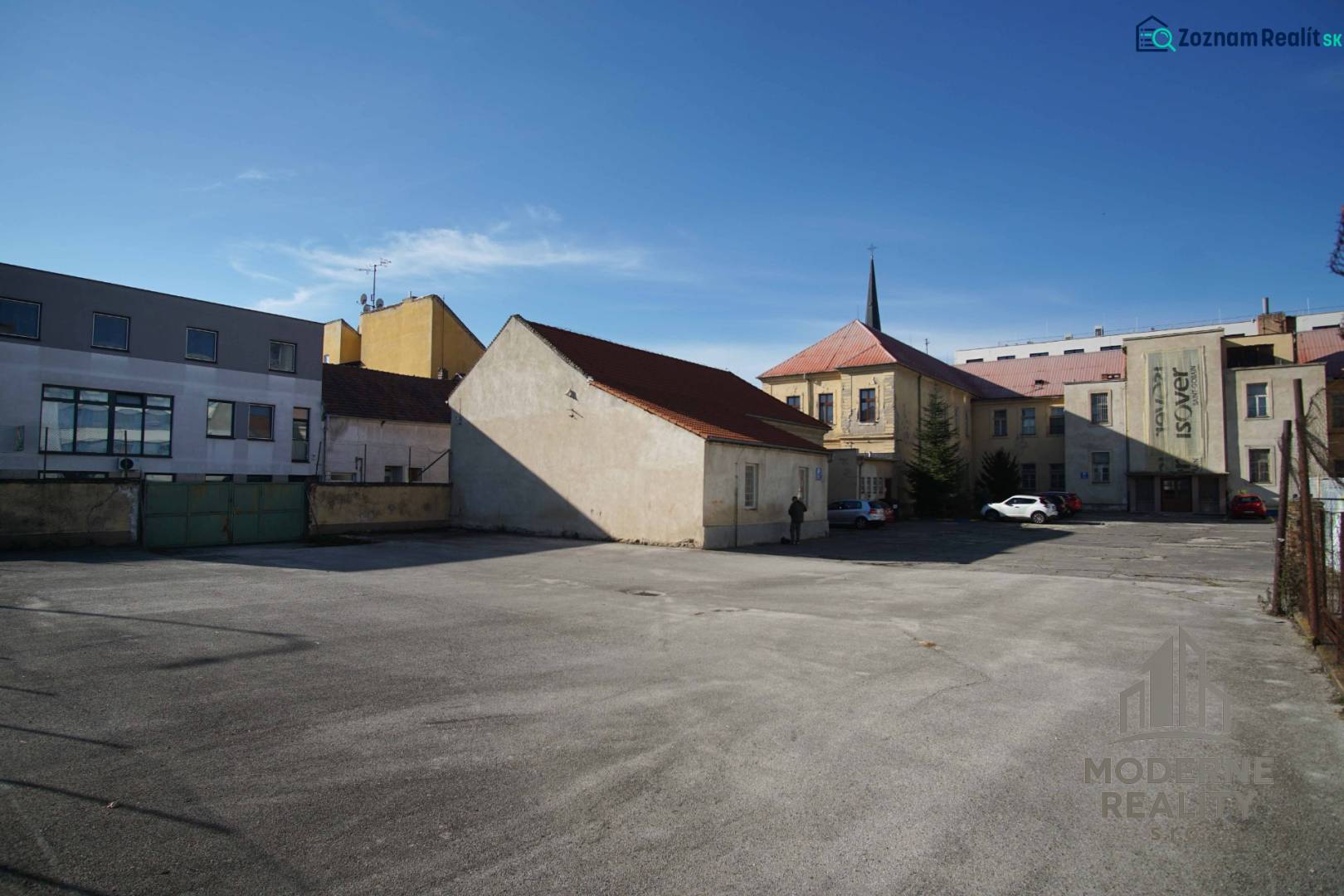 In the courtyard in Nové Zámky, there are various buildings suitable for plots - housing.