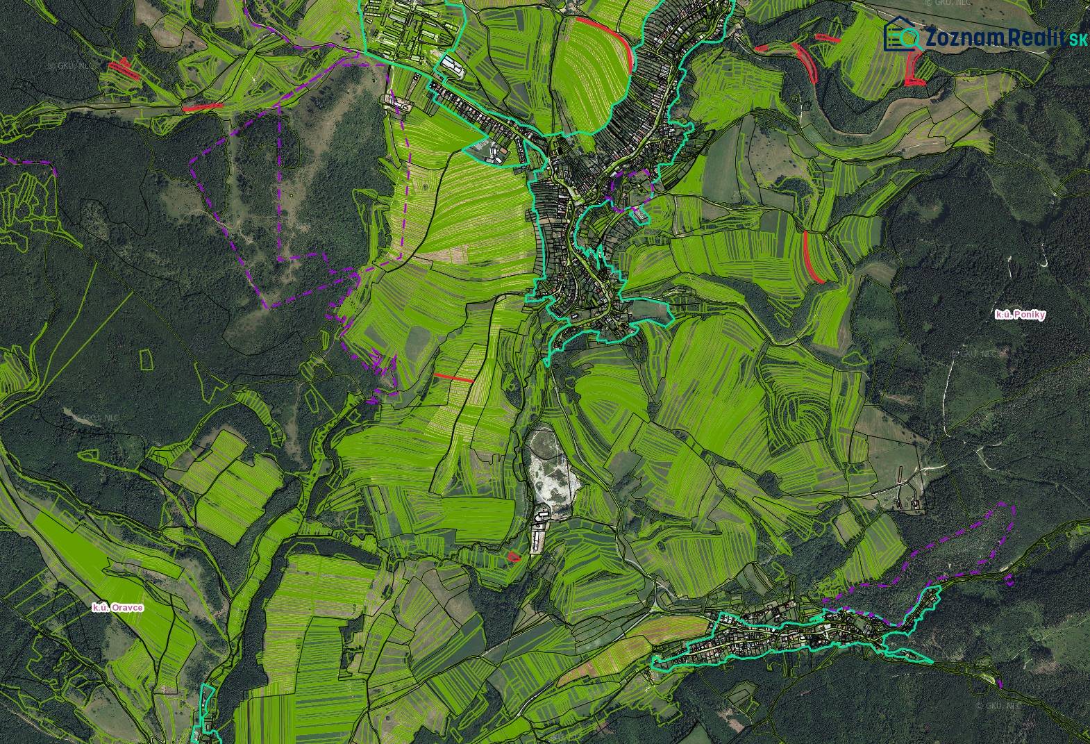Aerial view of agricultural and forest lands around the village of Poniky.
