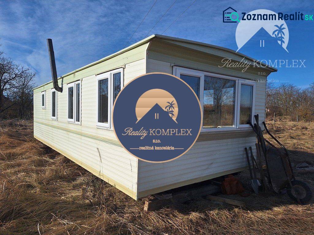 Mobile home on agricultural and forest land in Radvaň nad Dunajom.