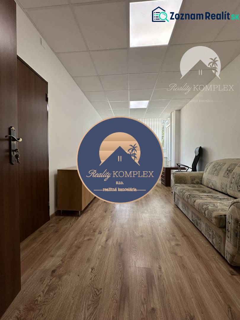 Offices with wood-patterned flooring and a sofa.