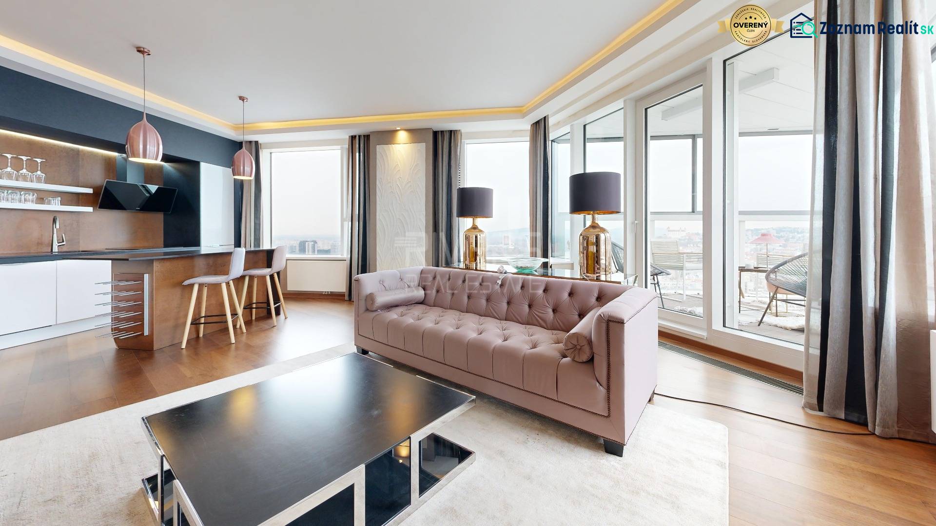 Living room in a 3-room apartment with a wooden decor floor and a panoramic view.