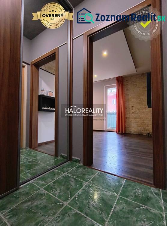 In the 2-room apartment, you can see a hallway with a green ceramic floor.