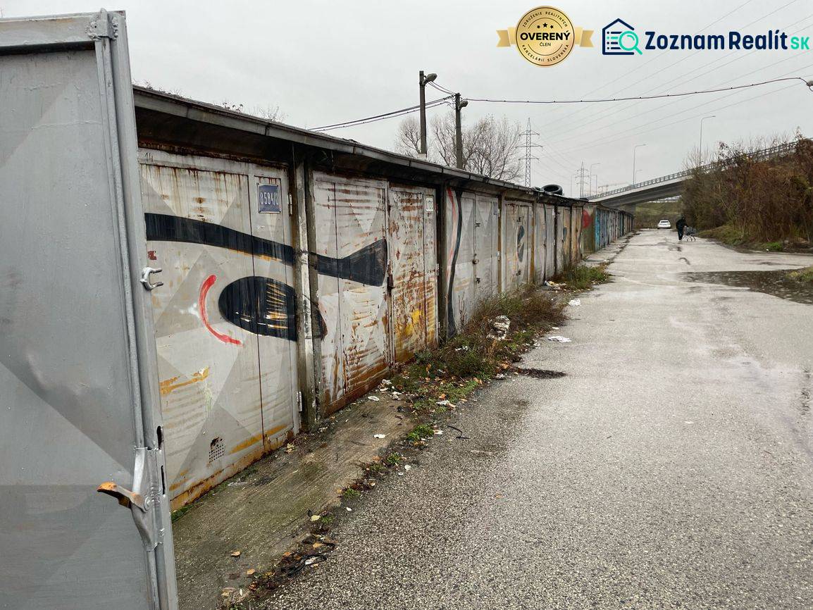 Garages on Prístavná Street in Bratislava - Ružinov with rectangular metal doors.