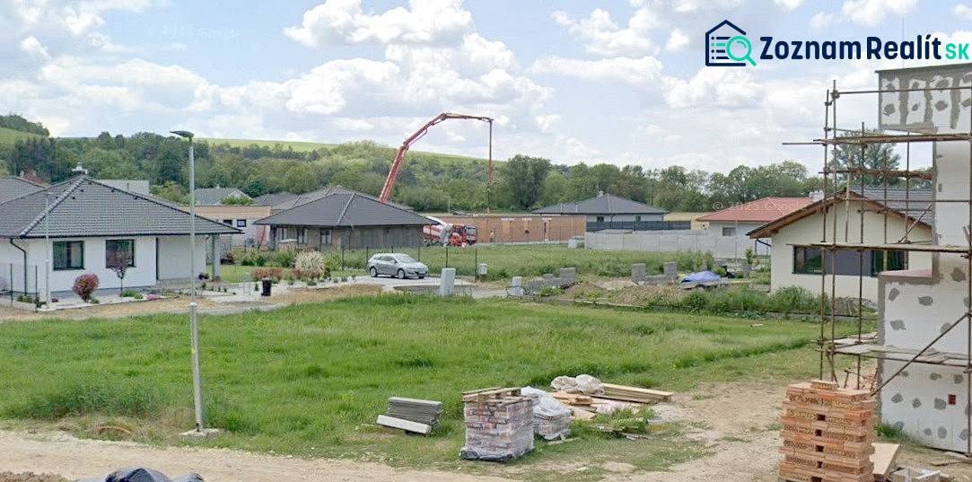 Plots - housing in Modrovka; visible unfinished houses and building materials.