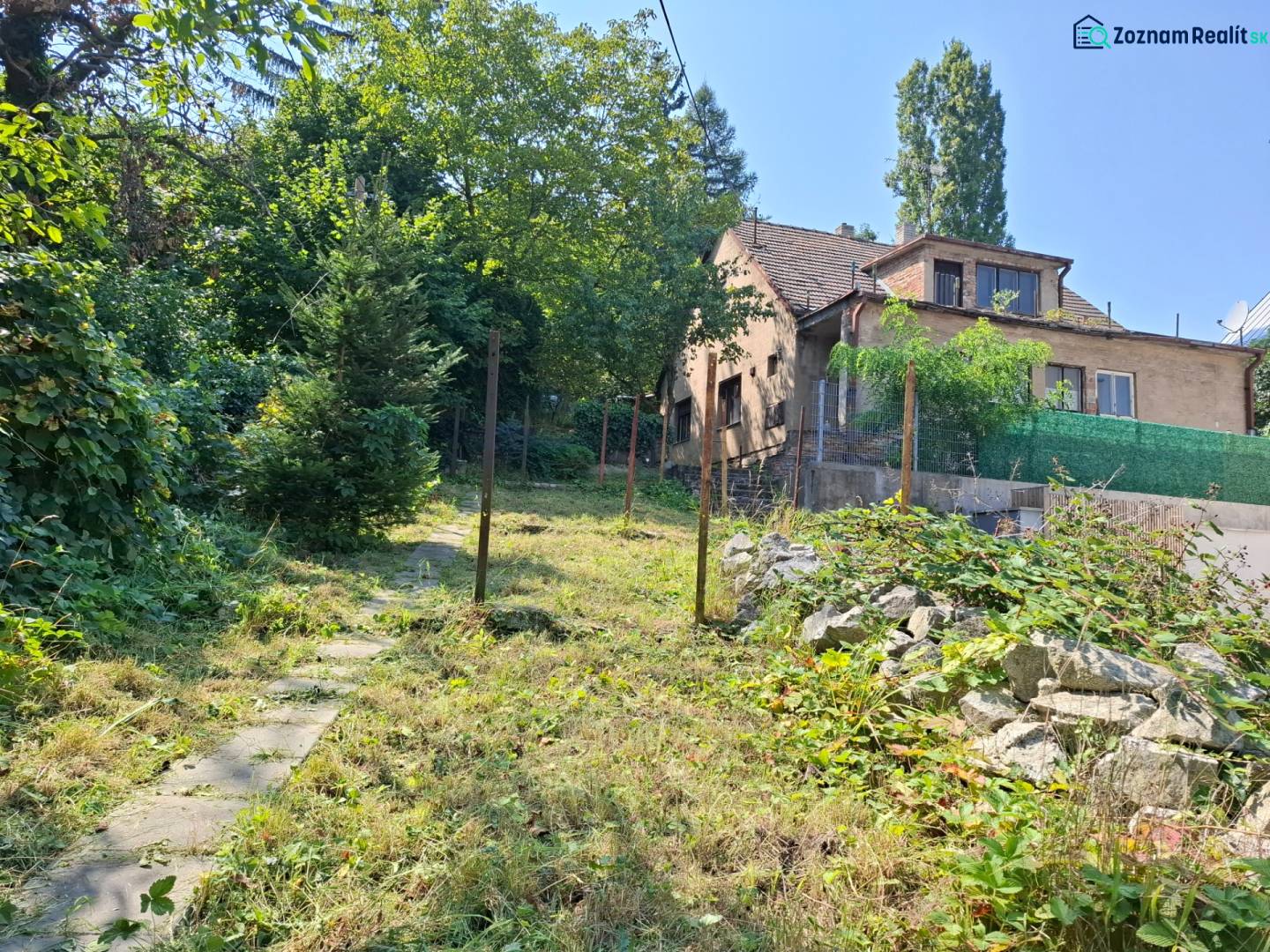 A family house on Búdková Street, surrounded by greenery in Bratislava - Staré Mesto.