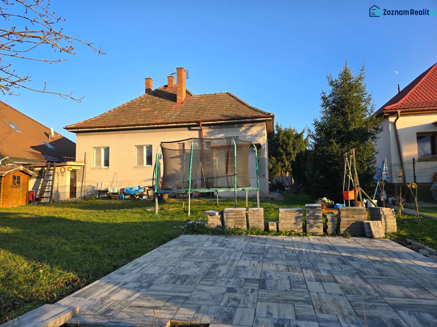 Family house on Slnečná Street in Nové Mesto nad Váhom with a grassy garden and terrace.