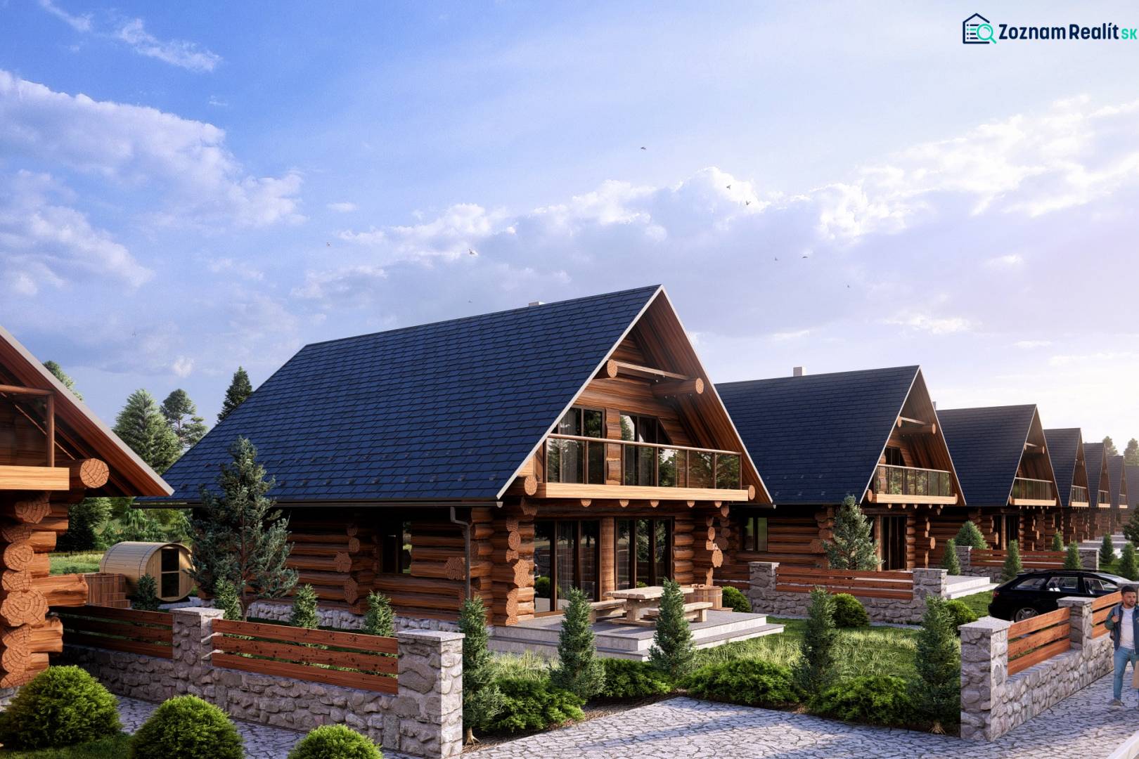 Construction of houses in Nová Lesná with wooden elements and stone fences.