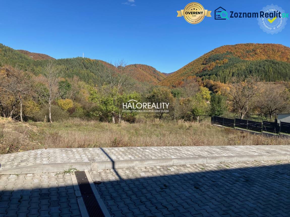 Autumn landscape in Kľačno with a hilly background. Land - residential for sale.