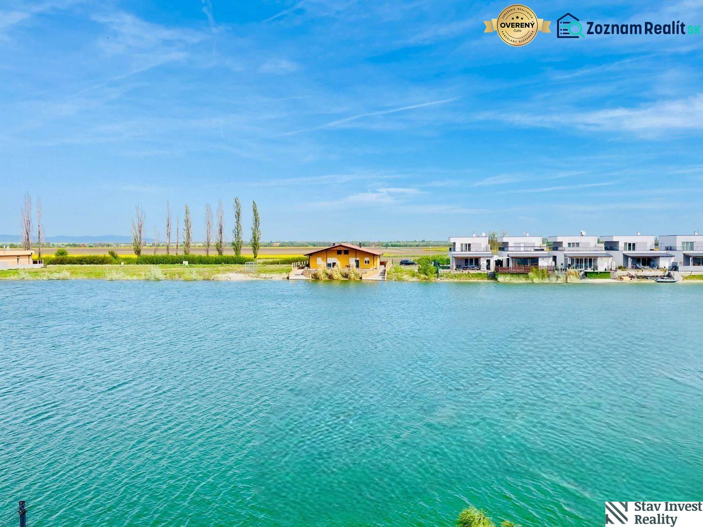 Lake in Senec with modern architecture on residential plots.