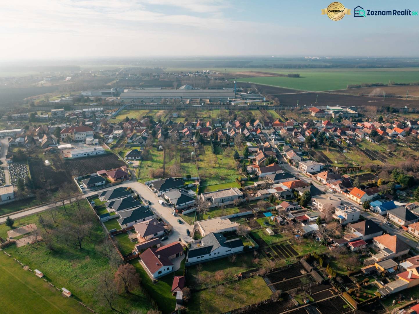 Aerial view of houses and gardens in the village of Vlčkovce, Land - residential.