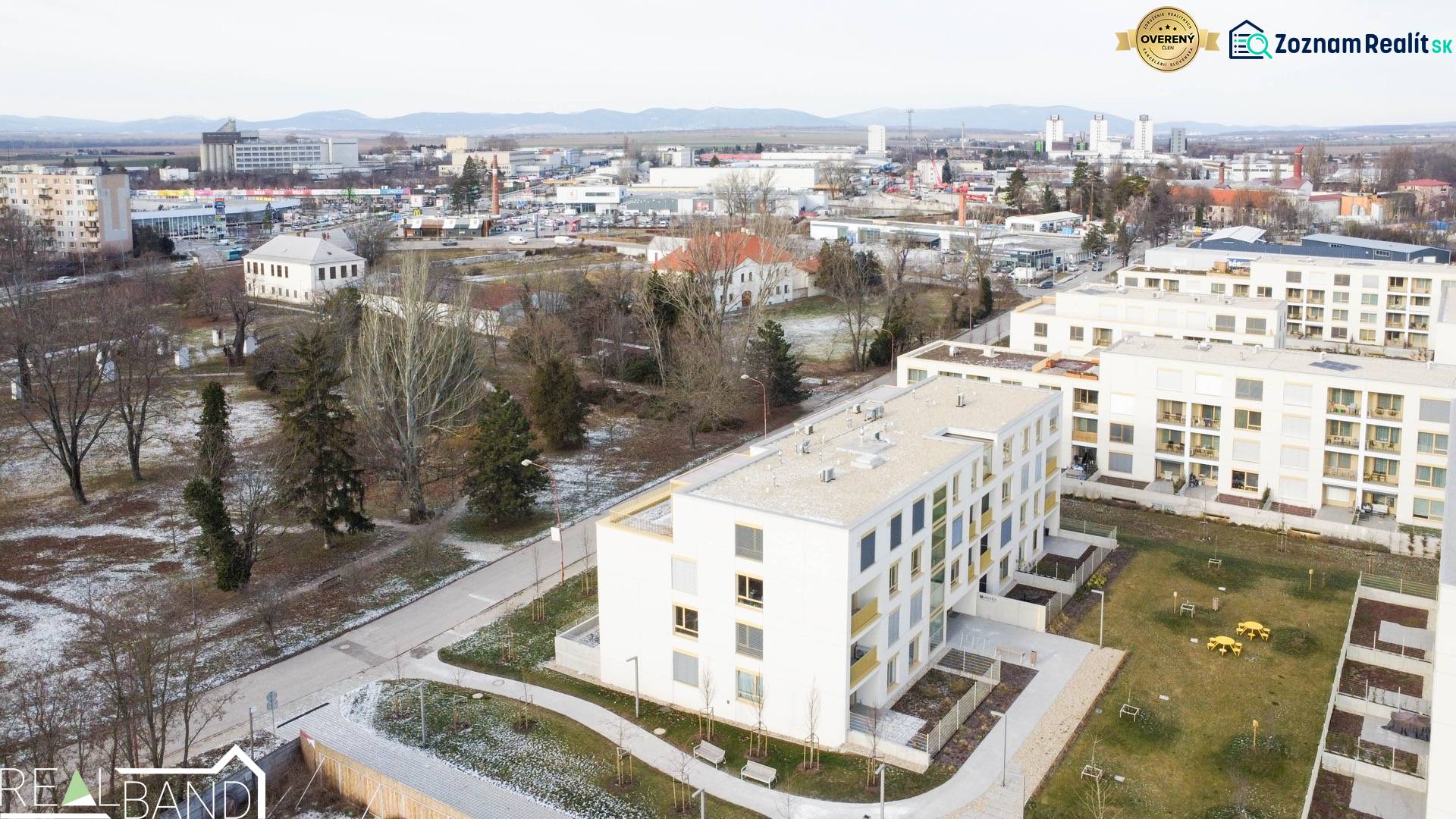 A view of apartment buildings on Cukrovarska Street in Trnava with green areas.