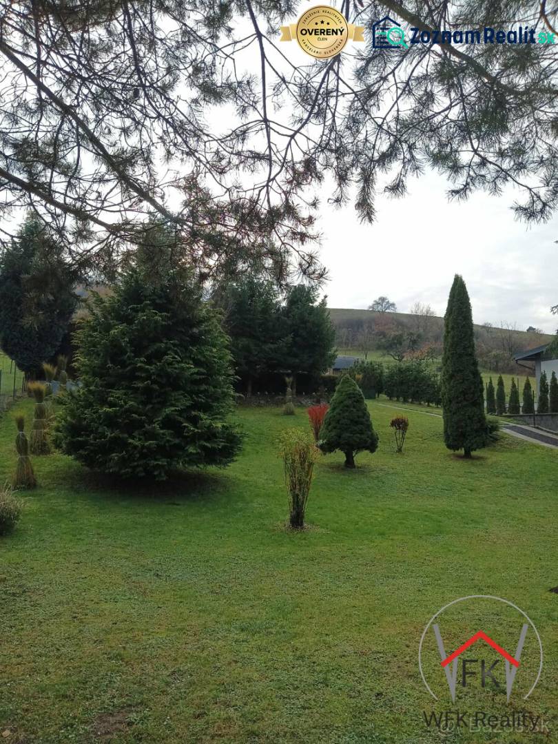 A garden with coniferous trees in Jasenovce on Jesenovce Street, suitable for residential plots.