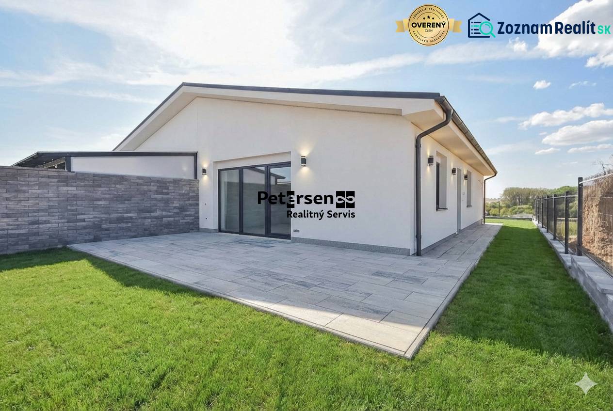 A family house in Belža on Belža Street has a terrace and a fenced area.