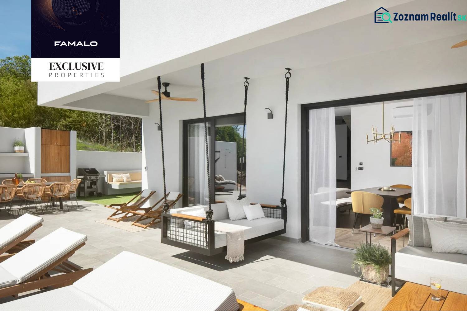 Exterior of the villa with a terrace in Labin. Relaxation loungers, hanging chair, dining area.