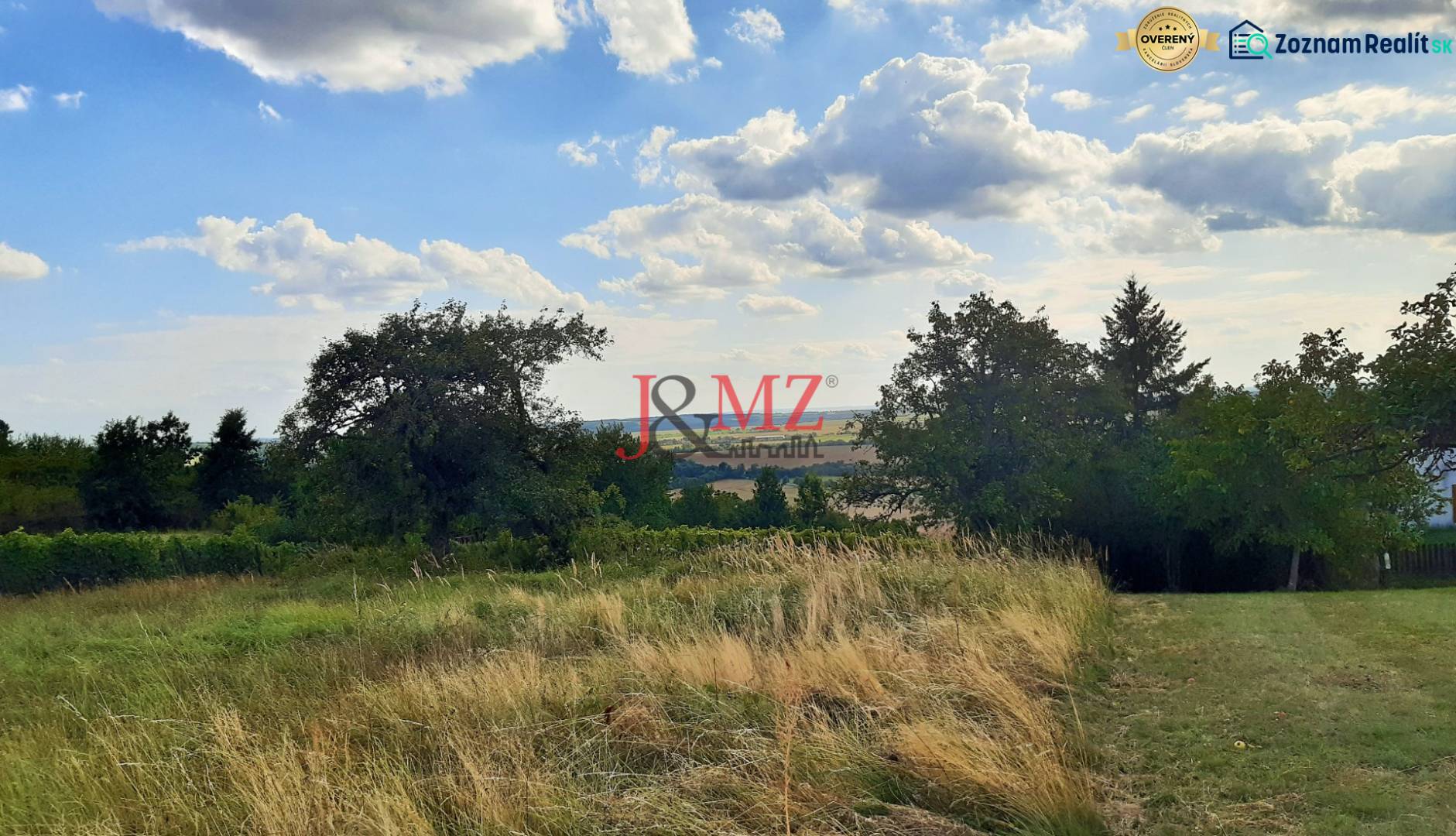 A landscape with grass and trees at the Recreational Grounds in Horné Jabloňovce, Jabloňovce.