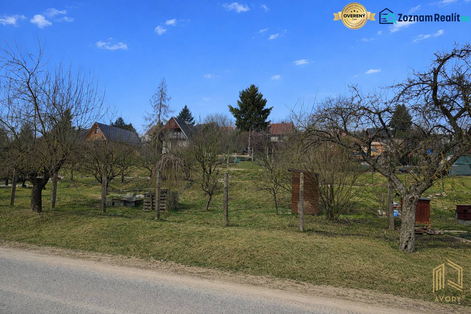 Gardens in Osuské on Opendáky with fruit trees and country cottages.