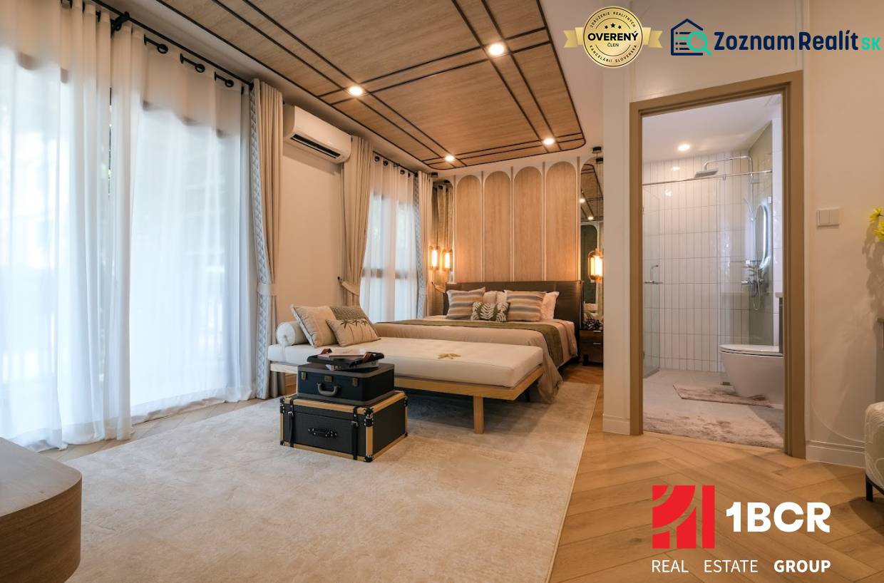 Bedroom in a 3-room apartment with carpet and wood-patterned flooring.