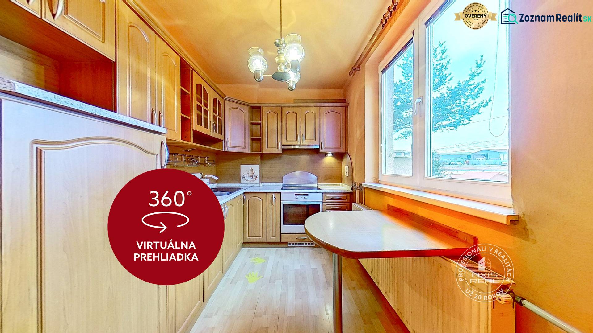 A kitchen in a 3-room apartment with a wooden decor and a view from the window.