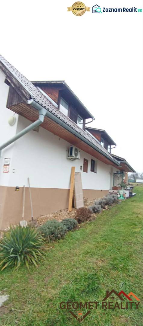 A family house on Cintorínska Street in Divín with a landscaped garden and an attic.