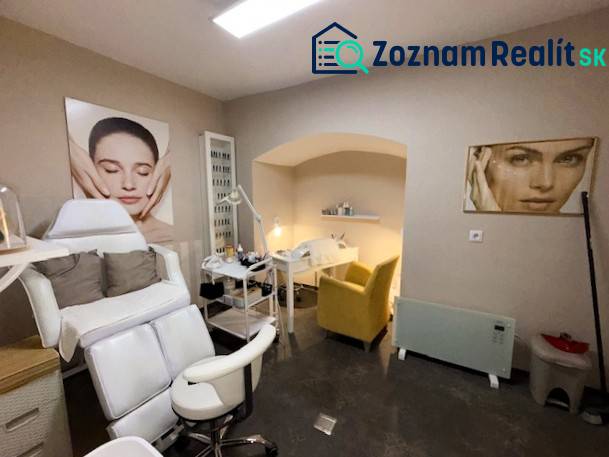 Commercial premises with chairs and wall decorations, floor with wooden decor.