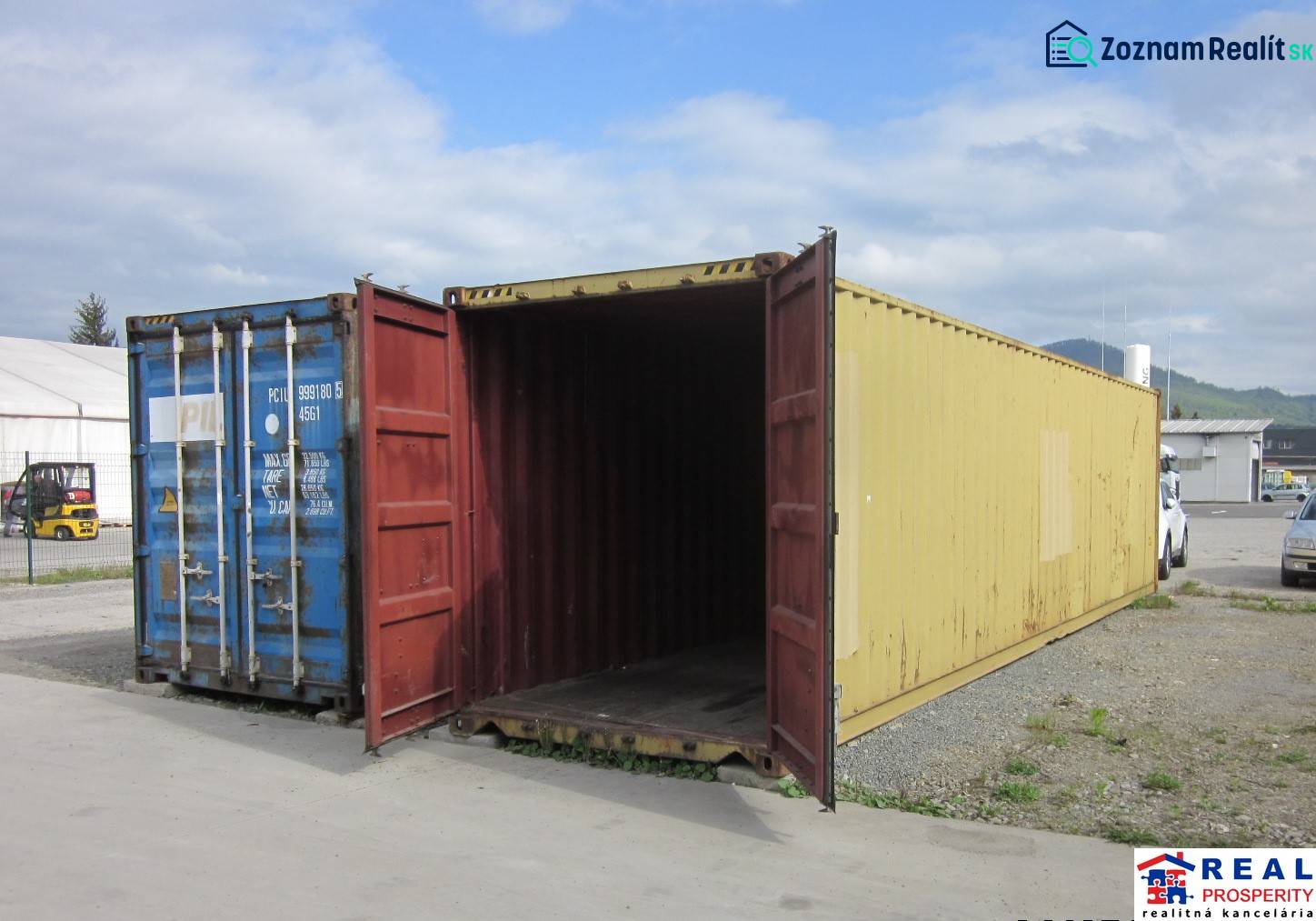 An open yellow container on Strojnícka Street in Prešov near warehouses and halls.