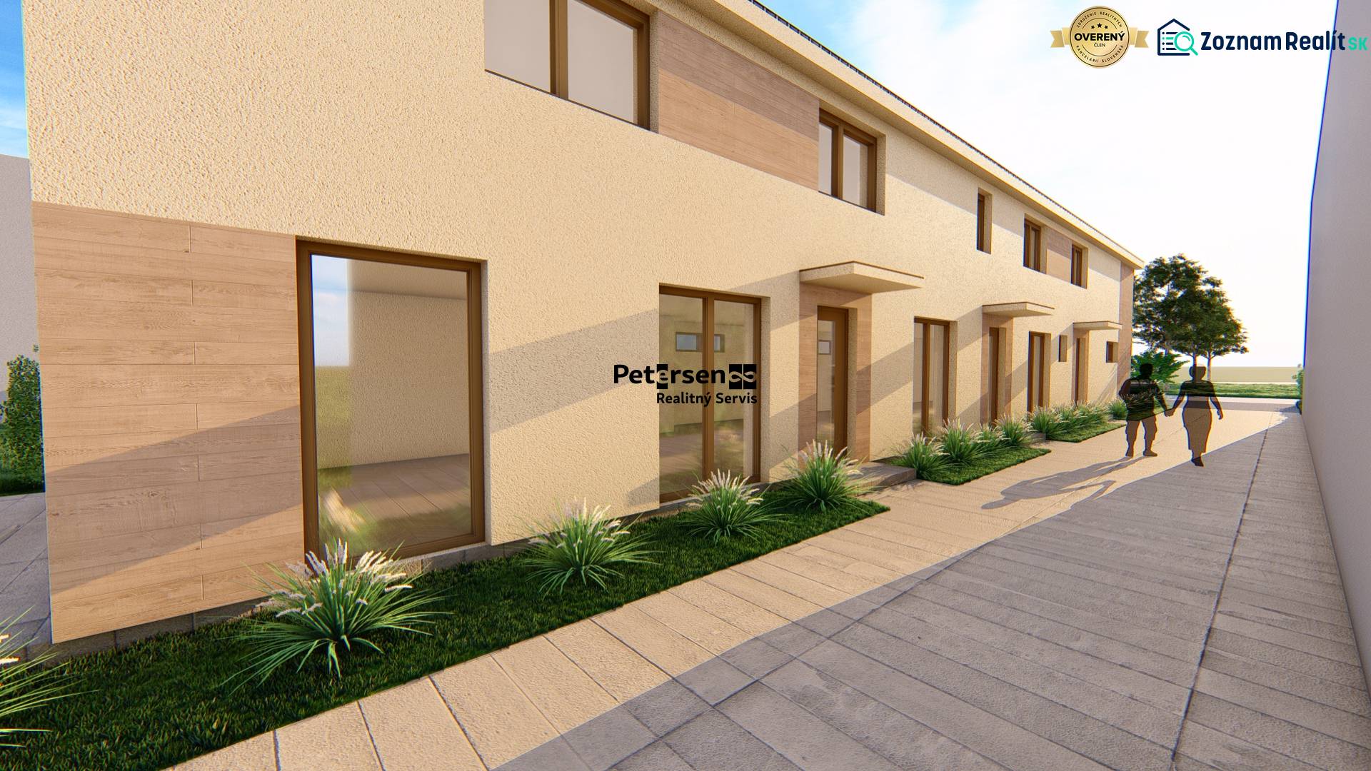 The flat facade of the building with tall windows and a sidewalk on Litoměřická Street in Topoľčianky.