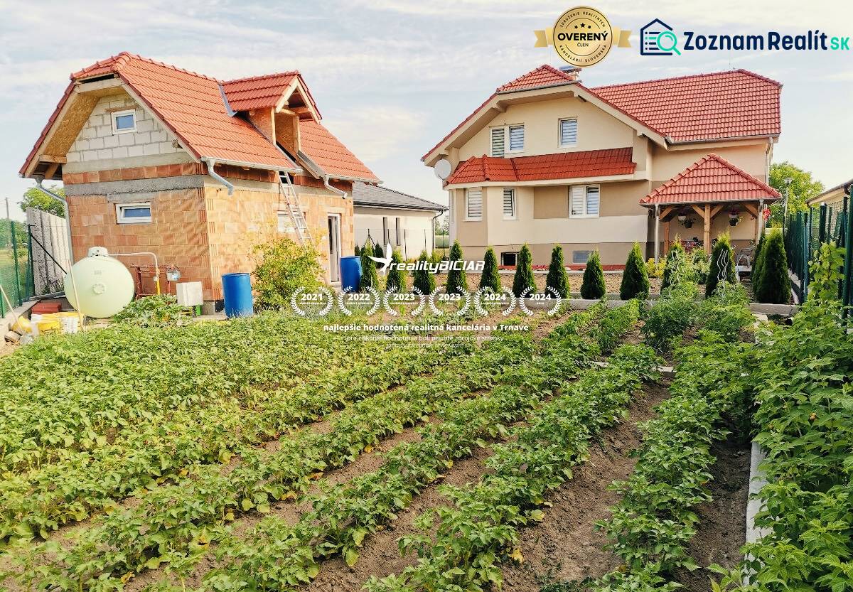A family house in Ratkovce with a spacious garden full of vegetables and trees.