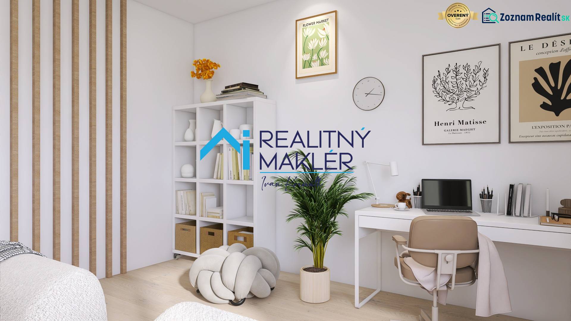 A workspace in a 3-room apartment with decorations, a plant, and white furniture.