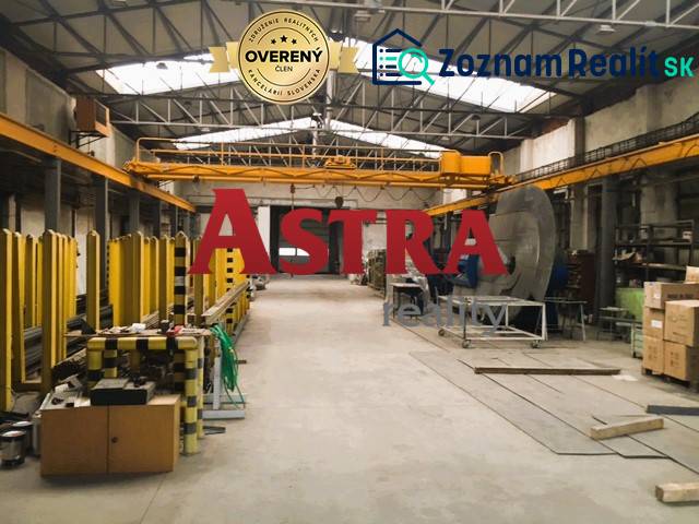 Production premises in Spišská Nová Ves with warehouses and a crane, industrial design.