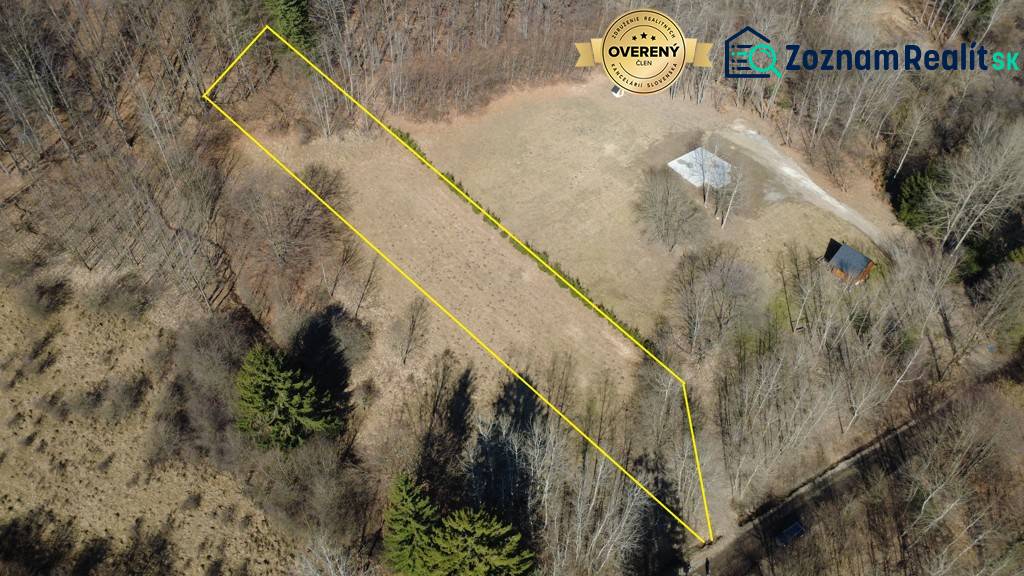 Recreational plots in Kľak with yellow borders and surrounding forest vegetation.