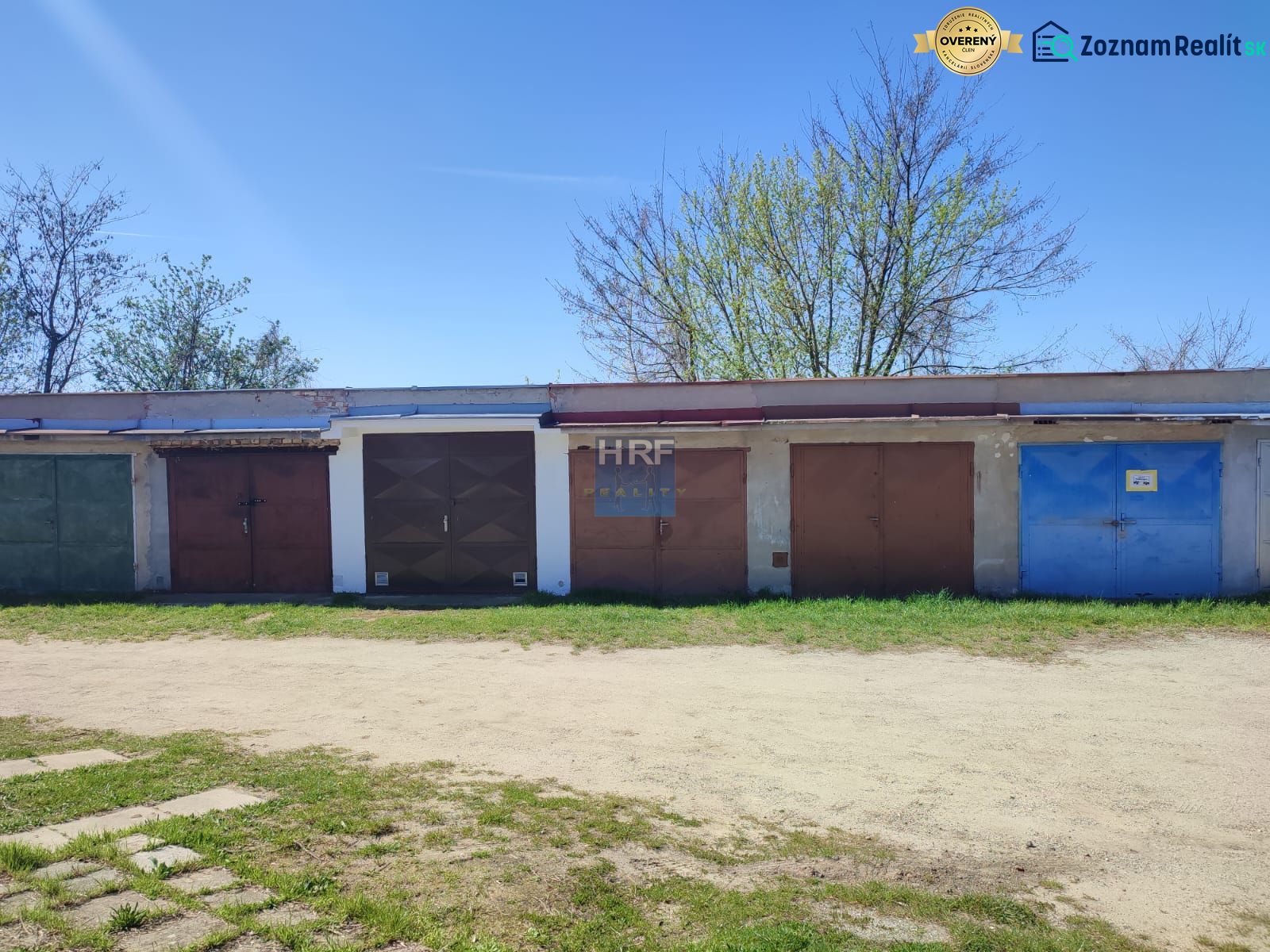 Garages on Veterná Street in Holíč with closed double-wing doors.
