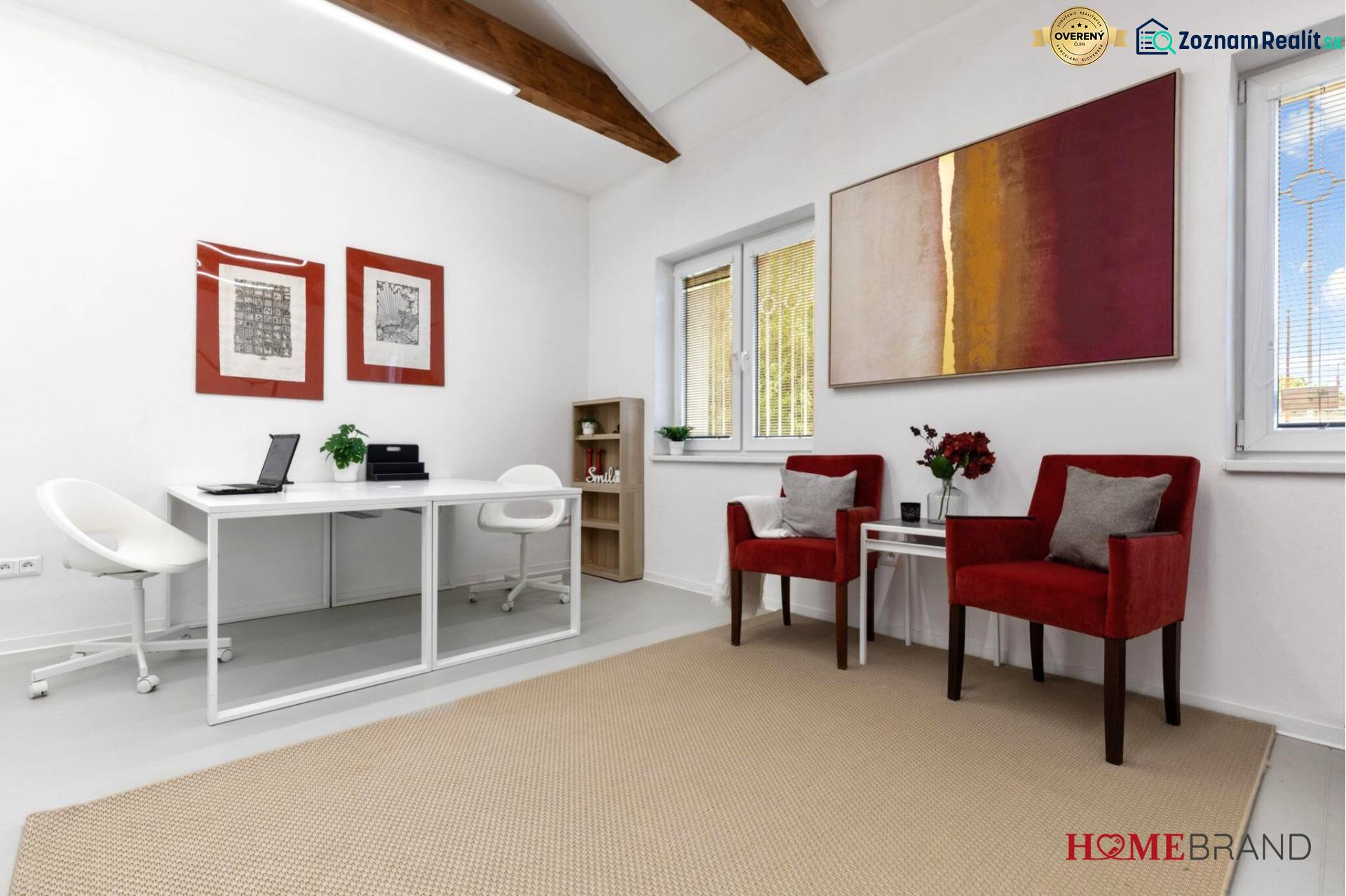 Offices with white furniture, red chairs, decorations, and wooden beams on the ceiling.