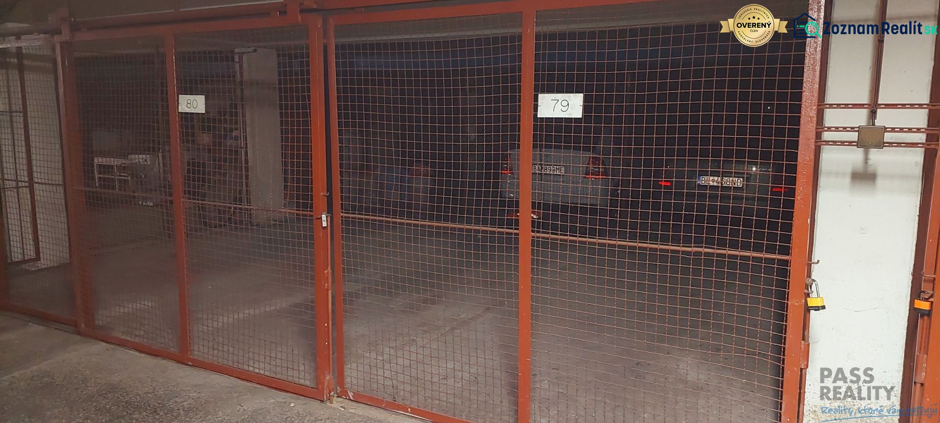 Garages with metal gates and cars in the background on Ondavská in Bratislava - Nivy.