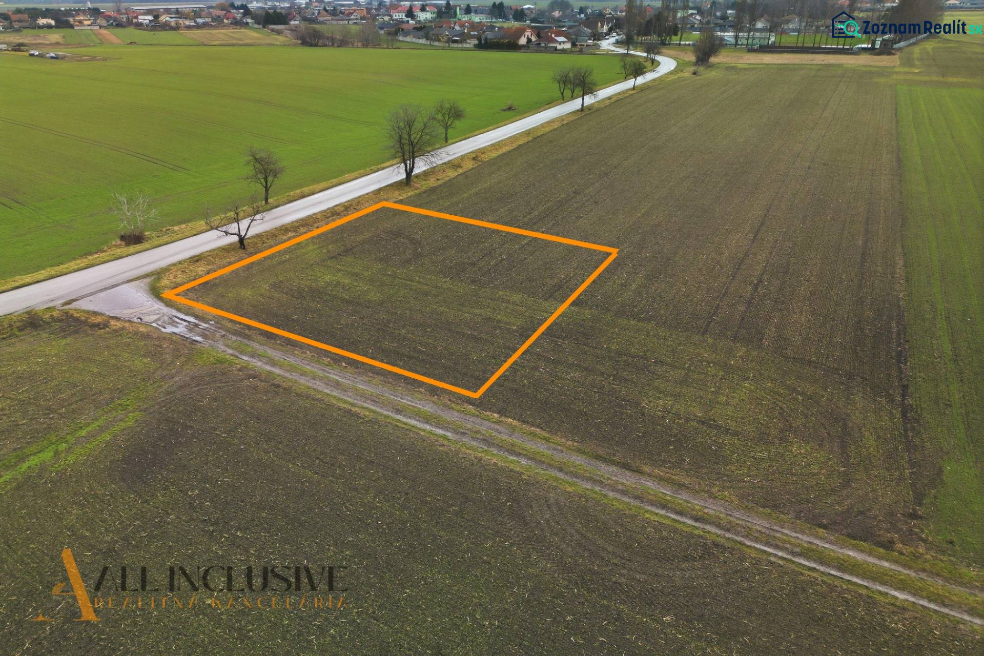 Plots - housing in Šipošovské Kračany in Kostolné Kračany, surrounded by fields and a road.