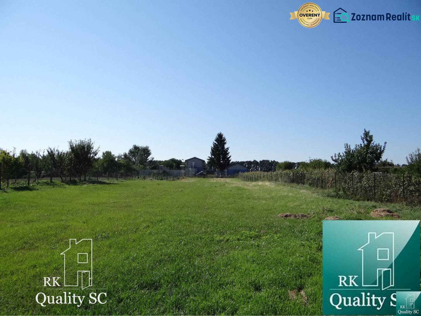 A residential plot on Vrbová Street in Jelka surrounded by greenery and fencing.